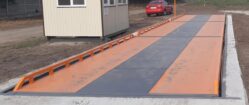 Cap for track concrete weighbridge